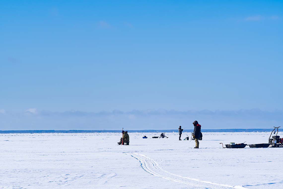 Ice Anglers on a lake ice fishing Ice Anglers on a lake ice fishing